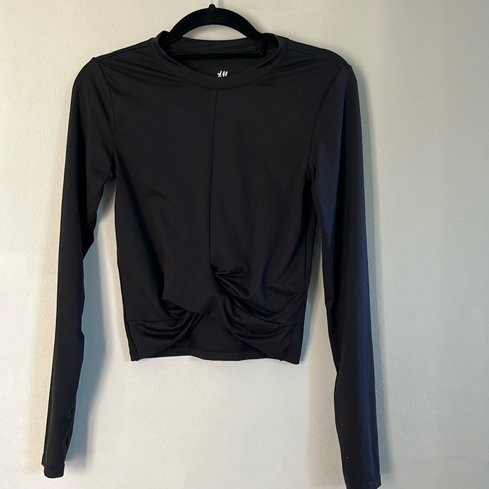 Women’s black long sleeve jersey crop top. Size S